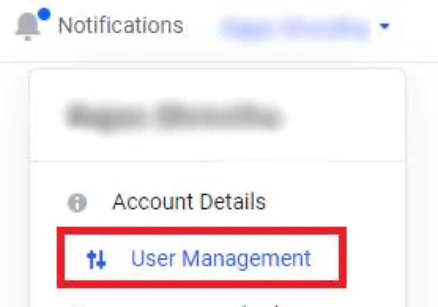 Your name at the top right, then User Management
