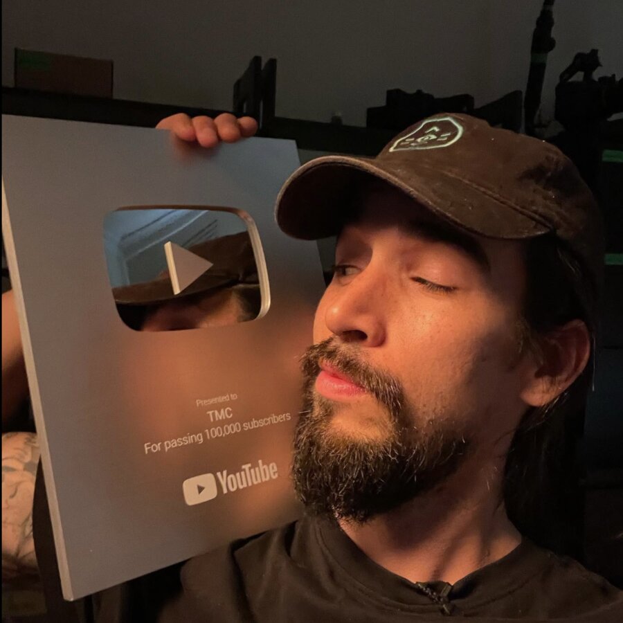 The YouTube silver play button awarded to TMC for passing 100,000 subscribers