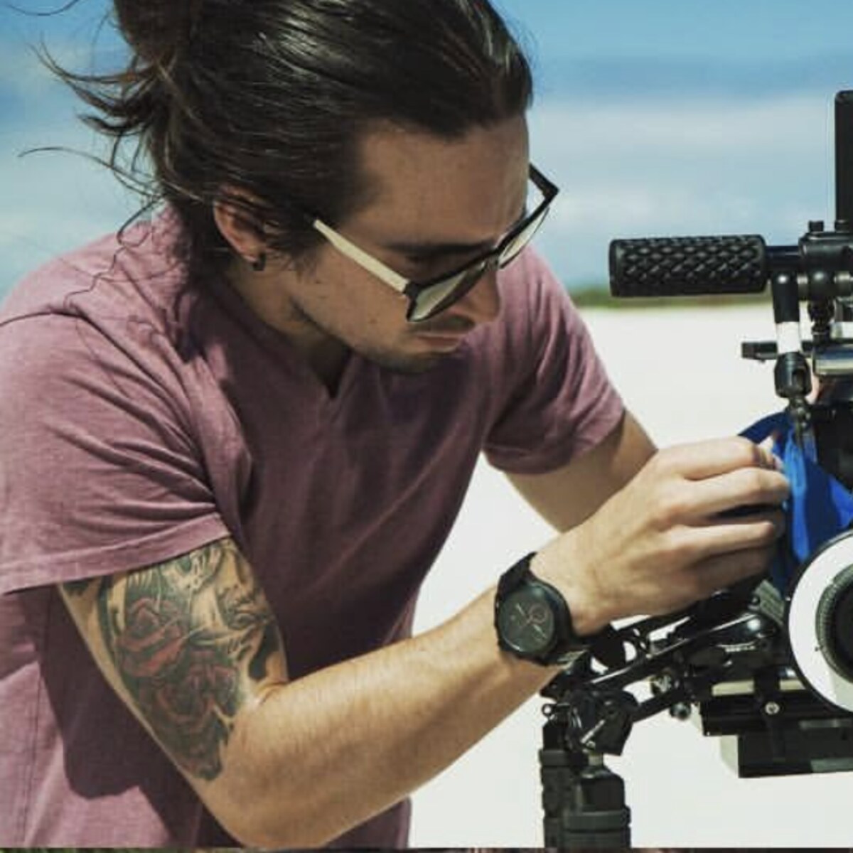 Tim McCartney setting up a RED cinema camera on location